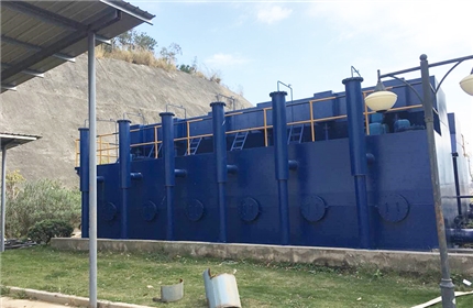 A waste-to-energy plant water purification system